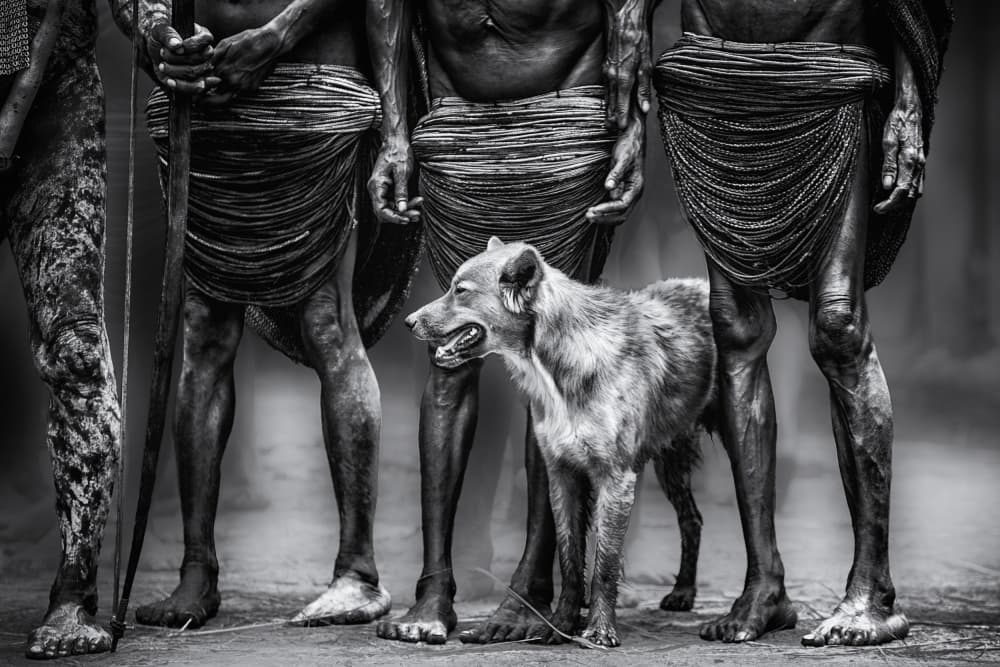 Tribal Men with Dog by Pavol Stranak — canvas wall art