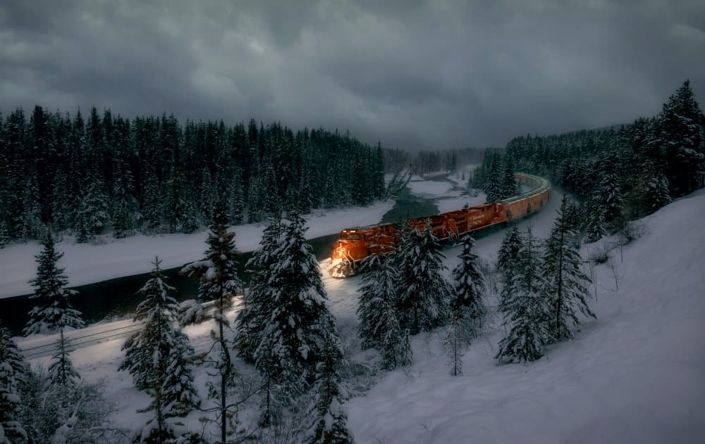 Snowy Forest Train by Gu and Hongchao — canvas wall art