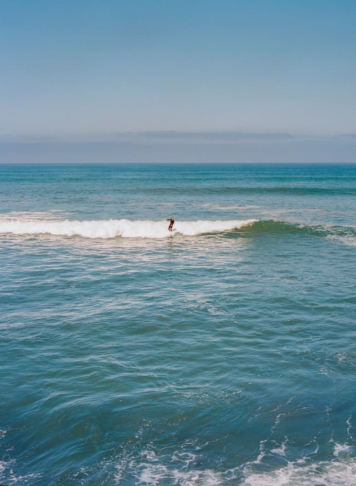Ocean Wave Rider by Bethany Young — canvas wall art