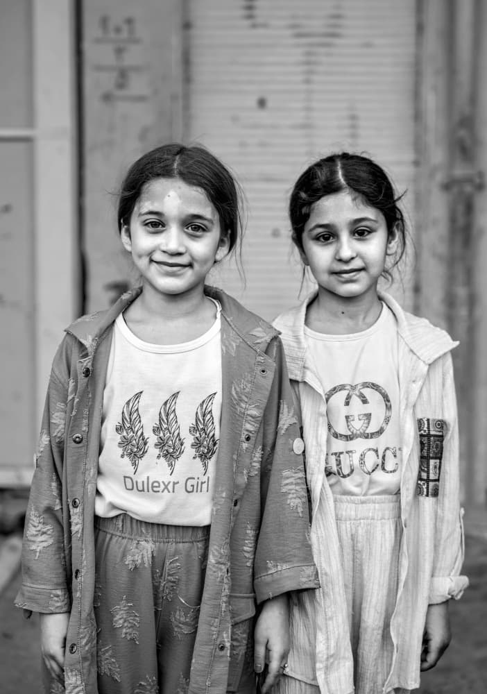 Two Happy Street Girls by Bashar Alsofey — canvas wall art