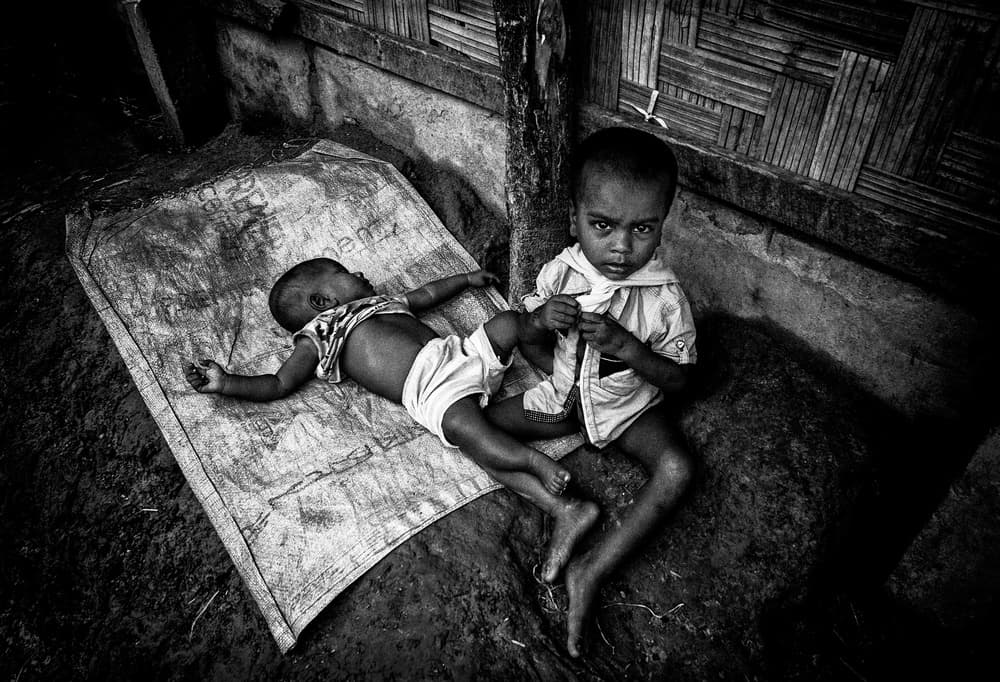 Young Brothers Poignant Gaze by Joxe Inazio Kuesta Garmendia — canvas wall art