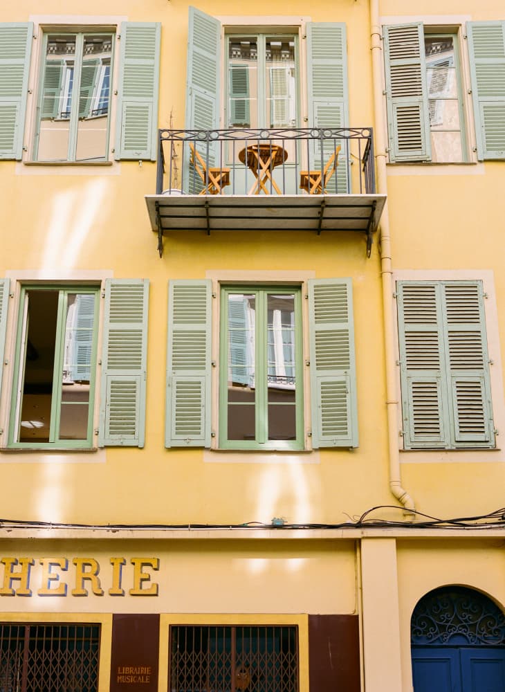 Sunny French Balcony by Bethany Young — canvas wall art