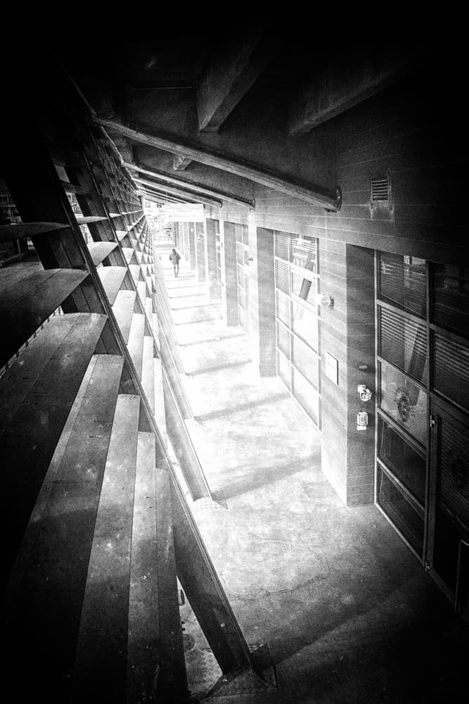 Stairwell Light and Shadow by Enrico Facchetti — canvas wall art