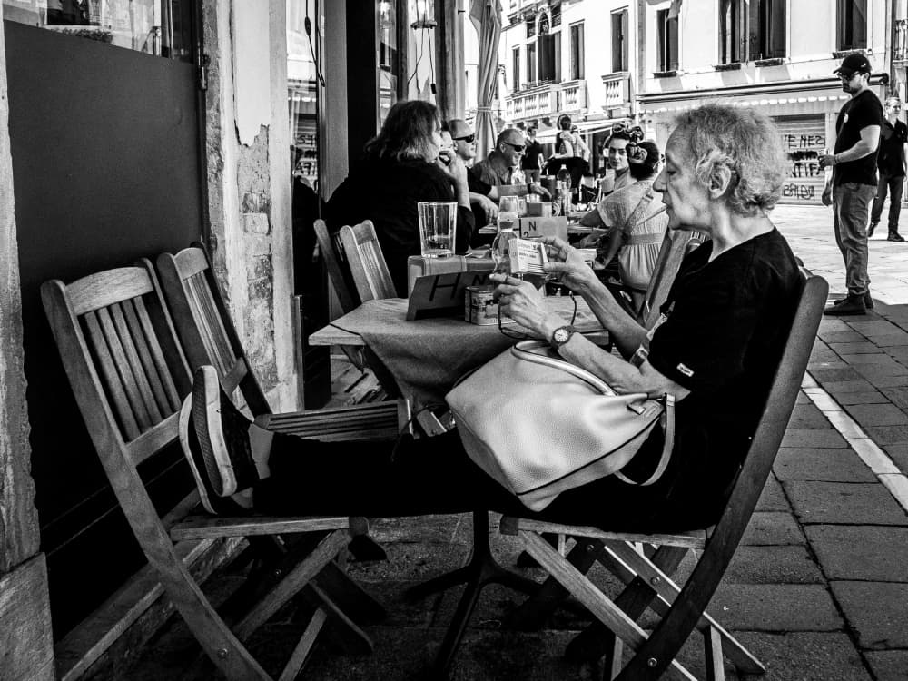Woman At Outdoor Cafe by Adam Street Photographer — canvas wall art