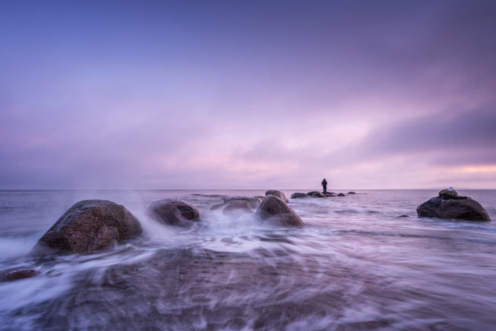 Purple Ocean Solitary Figure by fotomarion — canvas wall art