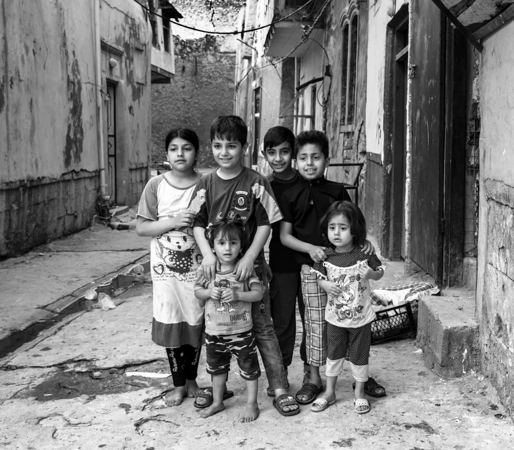 Urban Children Smiling by Jalili — canvas wall art