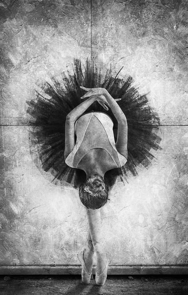 Elegant Ballerina Pointe Pose by Sebastian Kisworo — canvas wall art