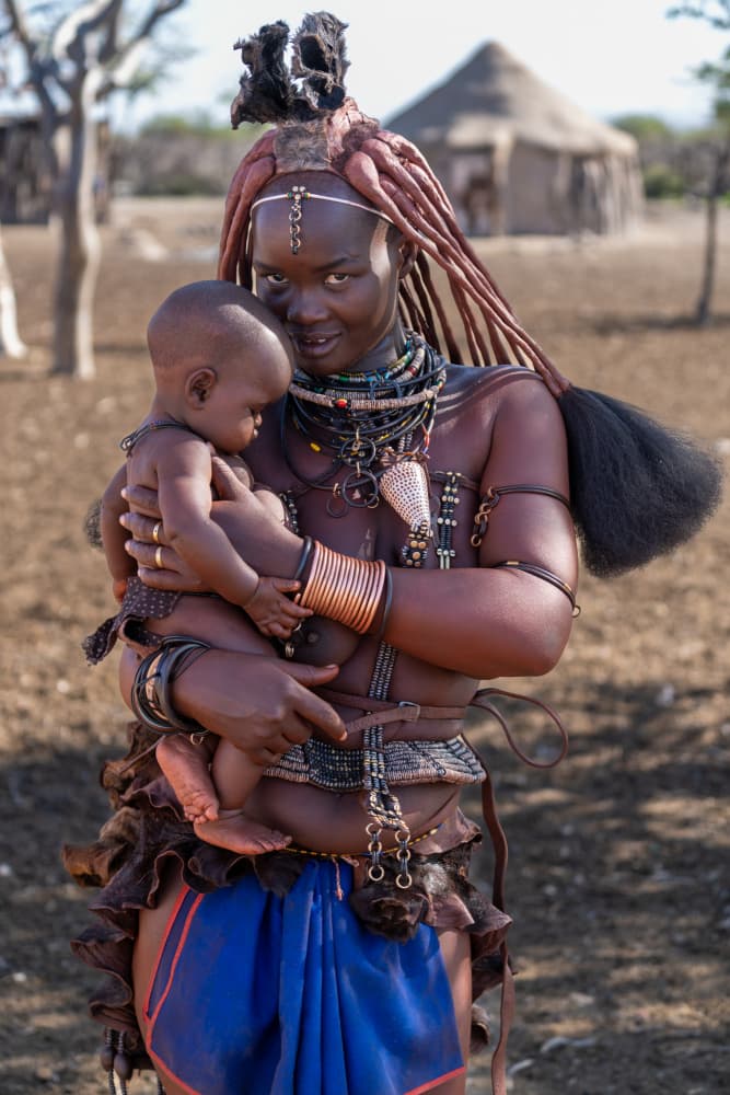 Himba Mother and Child by Eyal Alcalay — canvas wall art