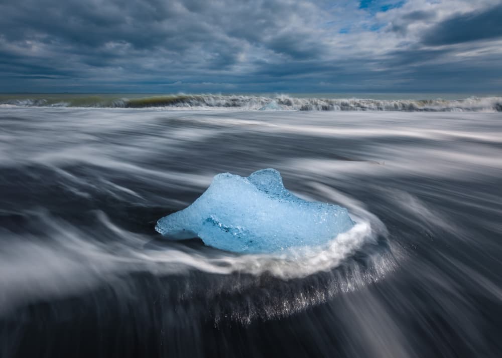 Blue Ice on Black Sand by Irene Wu — canvas wall art