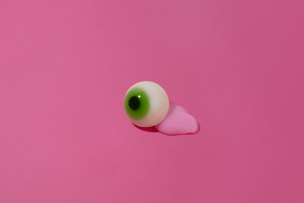 Green Eyeball On Pink by Julia Ramiro — canvas wall art