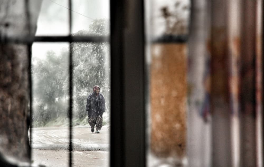 Solitary Walk in Rain by Ali Ayer — canvas wall art