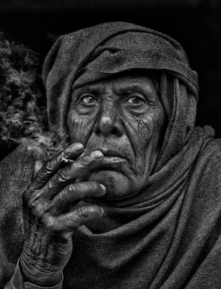 Elderly Man Smoking by Haitham AL Farsi — canvas wall art