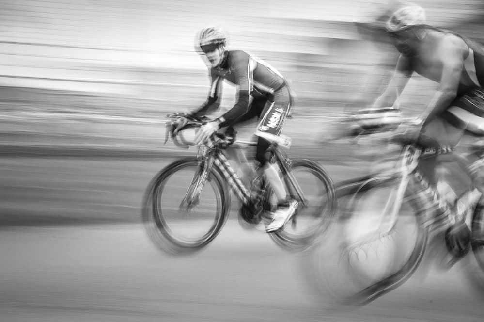 Speeding Cyclists Race by Benny Pettersson — canvas wall art
