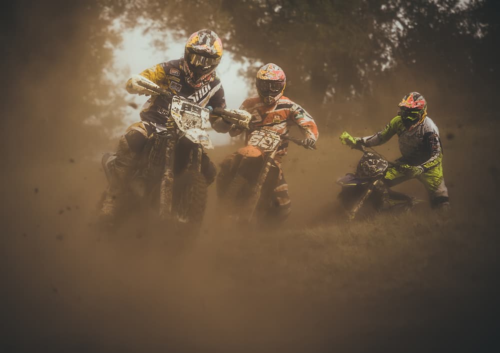 Dusty Motocross Race by Carlos Gonzalez — canvas wall art