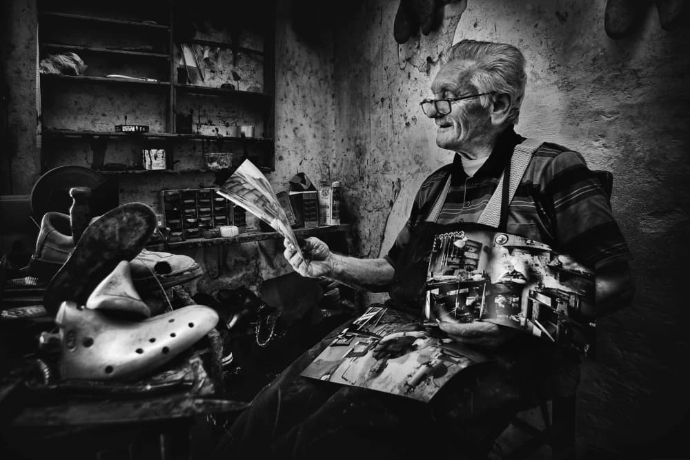 Smiling Cobbler Workshop by Antonio Grambone — canvas wall art