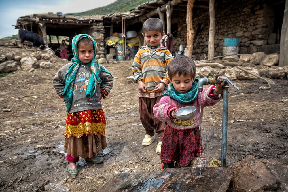 Village Children Collecting Water by Mohammadreza Momeni — canvas wall art