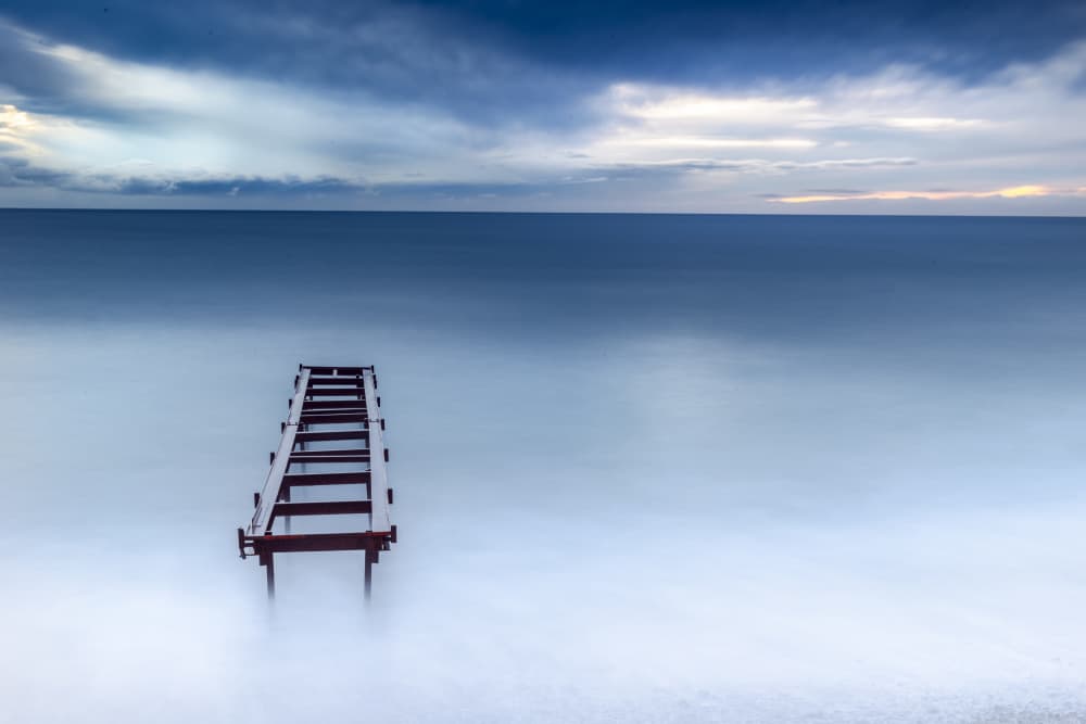 Tranquil Ocean Pier by Franco Ameli — canvas wall art