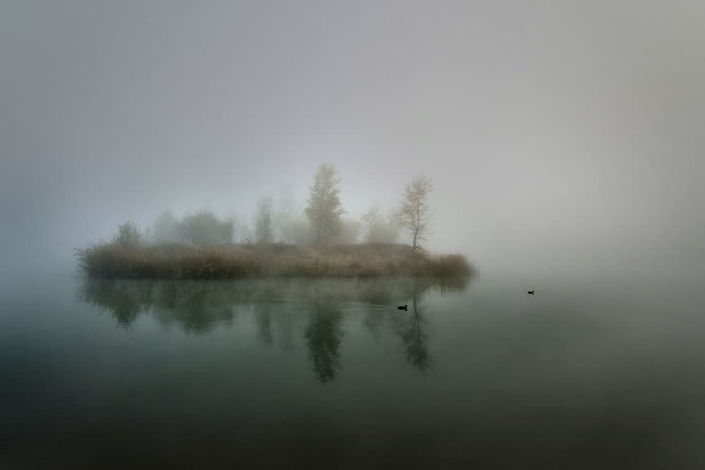 Tranquil Foggy Island by Claudio Moretti — canvas wall art