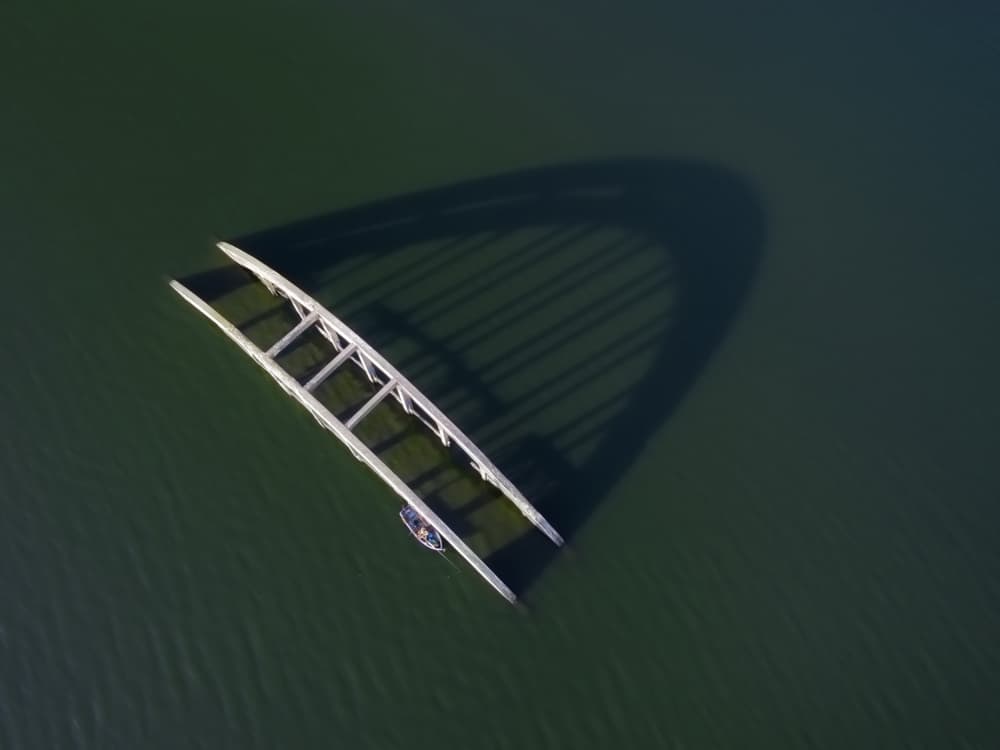 Curved Bridge Shadow on Water by Ilona Rosenkrancová — canvas wall art
