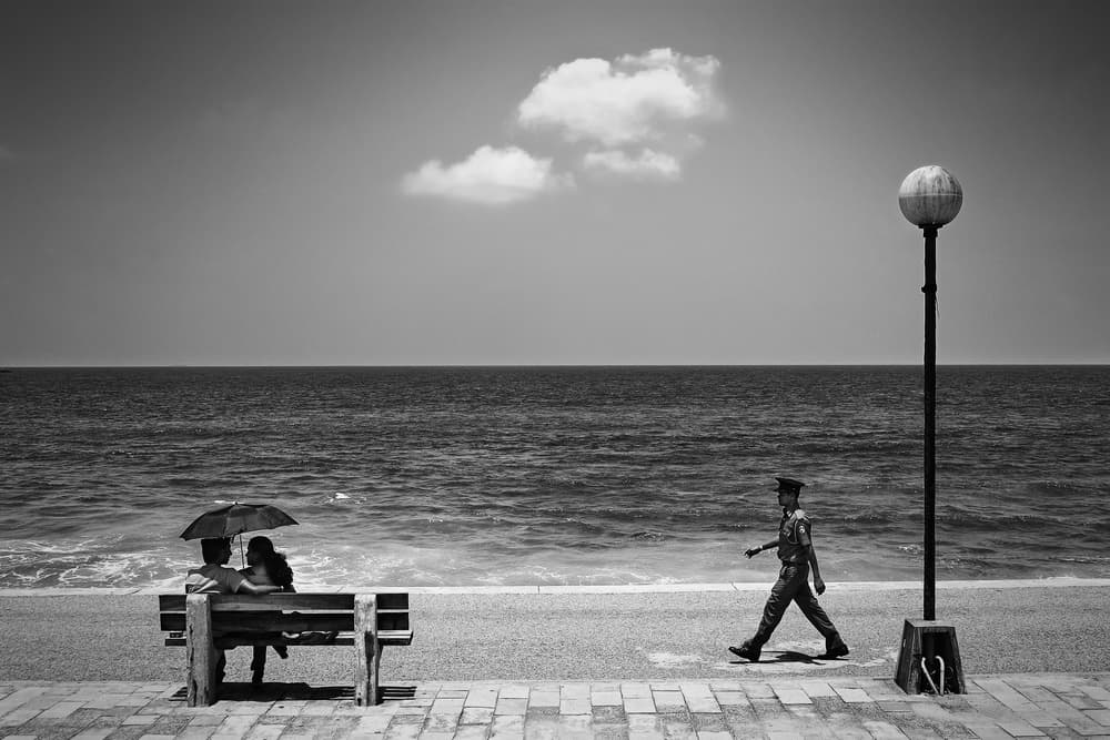 Ocean Couple Passing Soldier by Akira TAKAUE — canvas wall art