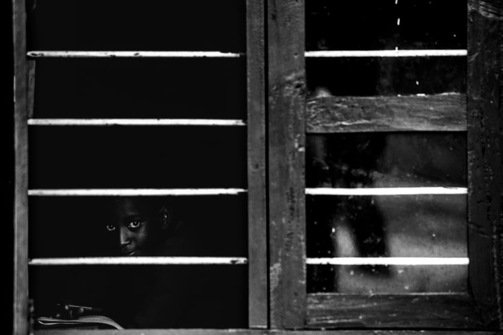 Child Peeking Through Blinds by Vedran Vidak — canvas wall art