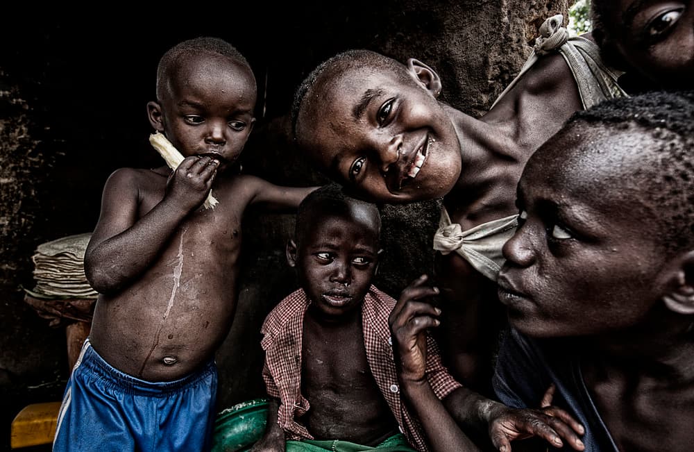 Joyful Village Children by Amnon Eichelberg — canvas wall art