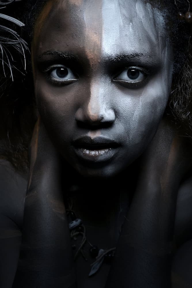Intense Painted Face by Olga Mest — canvas wall art