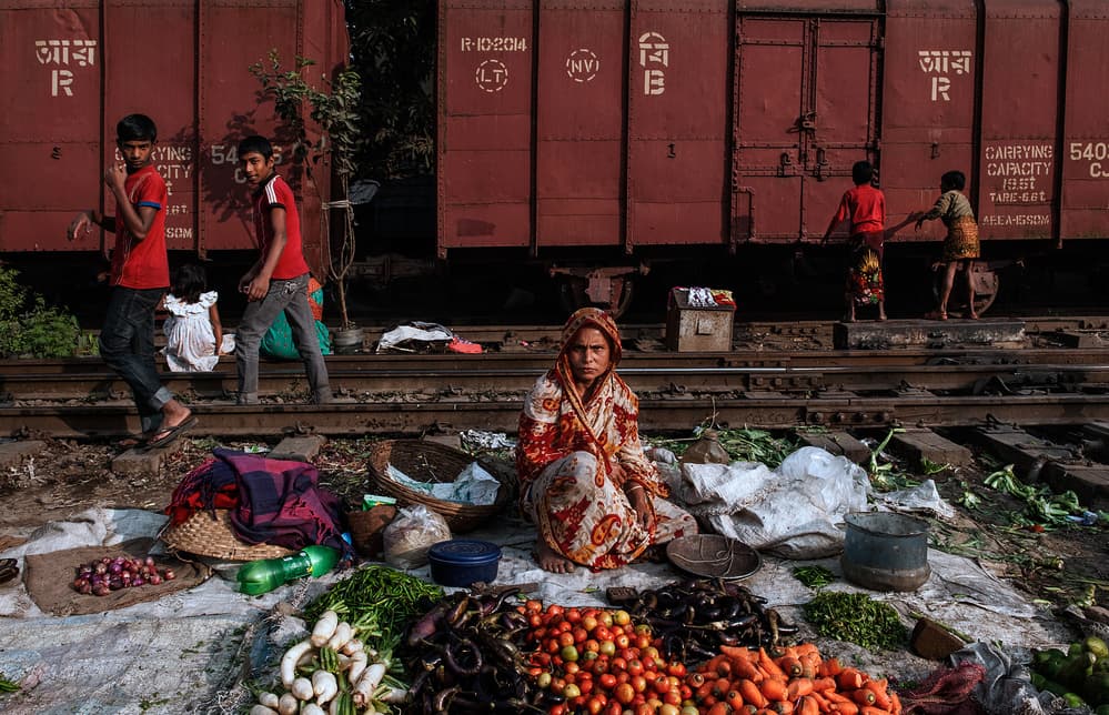 Trackside Market Life by Joxe Inazio Kuesta Garmendia — canvas wall art