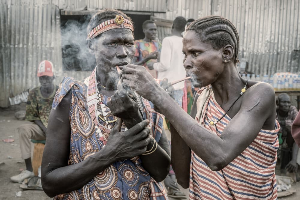 African Women Smoking Pipes by Trevor Cole — canvas wall art