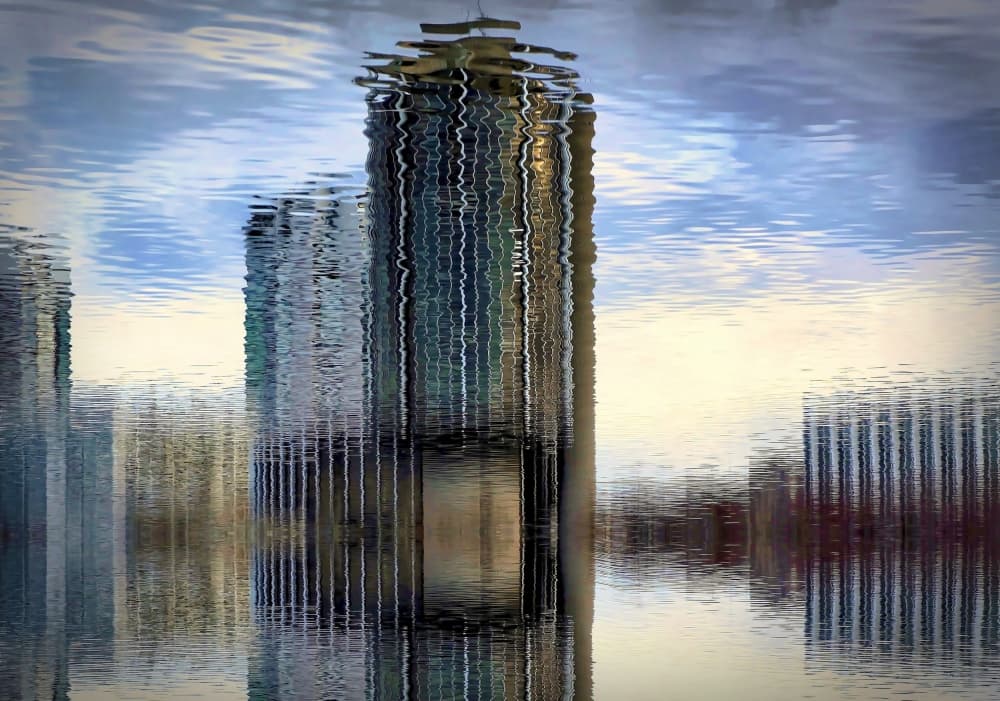 Rippled City Reflections by Anna Cseresnjes — canvas wall art