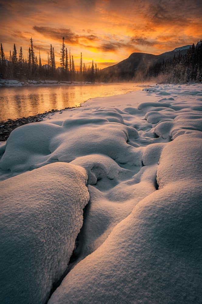 Snowy River Sunset Glow by Lydia Jacobs — canvas wall art