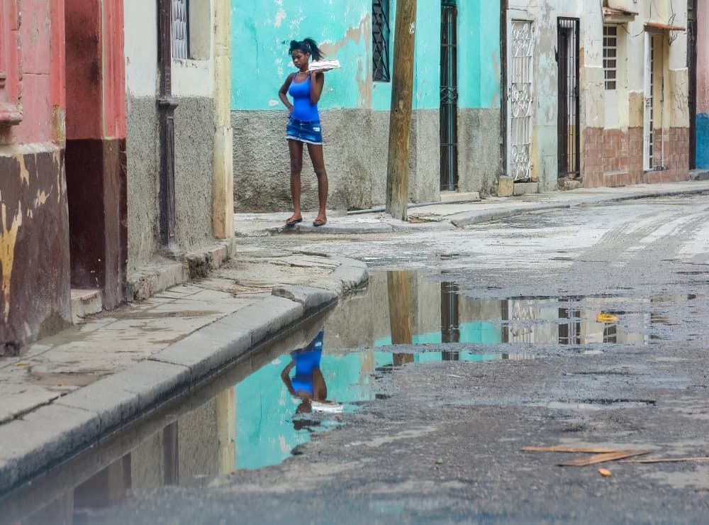 Woman and Street Reflection by Itzik Einhorn — canvas wall art