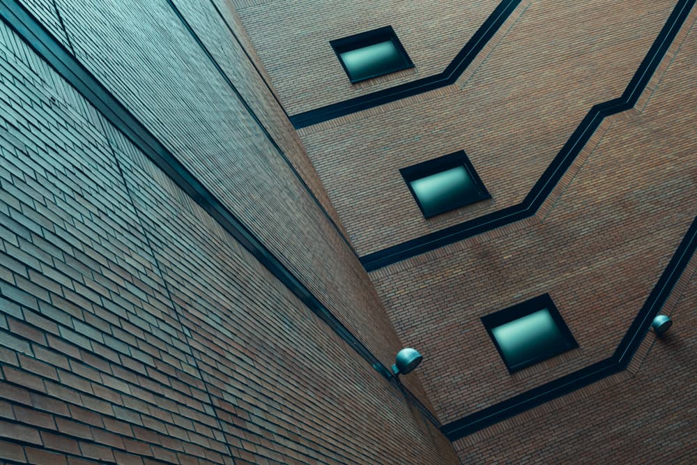 Geometric Brick Facade by Rolf Endermann — canvas wall art