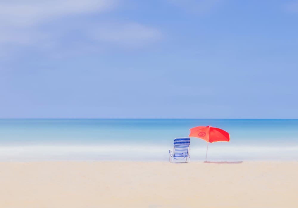 Red Umbrella Blue Sky by JUAN CARLOS HERVÁS MARTÍNEZ — canvas wall art