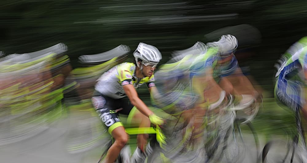 Speeding Road Cyclists by Milan Malovrh — canvas wall art