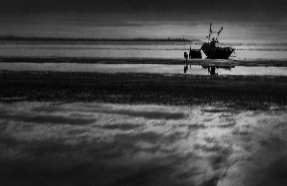 Man Dog Boat Reflection by Ekkachai Khemkum — canvas wall art
