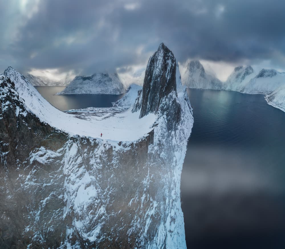 Lone Hiker Winter Fjord by Bingo Z — canvas wall art