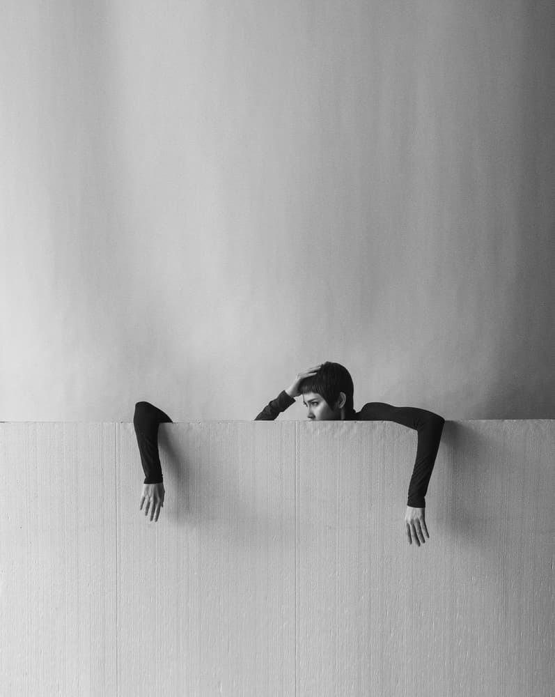 Pensive Woman Peeking by hardibudi — canvas wall art