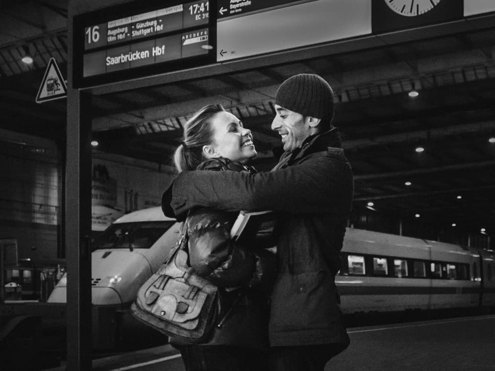 Joyful Station Embrace by Eiji Yamamoto — canvas wall art