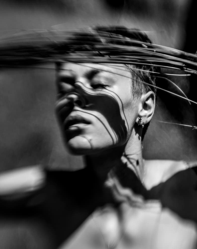Serene Woman Shadow Play by Bogdan Bouşcă — canvas wall art
