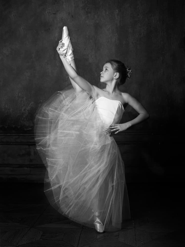 Young Ballerina on Pointe by Victoria Glinka — canvas wall art