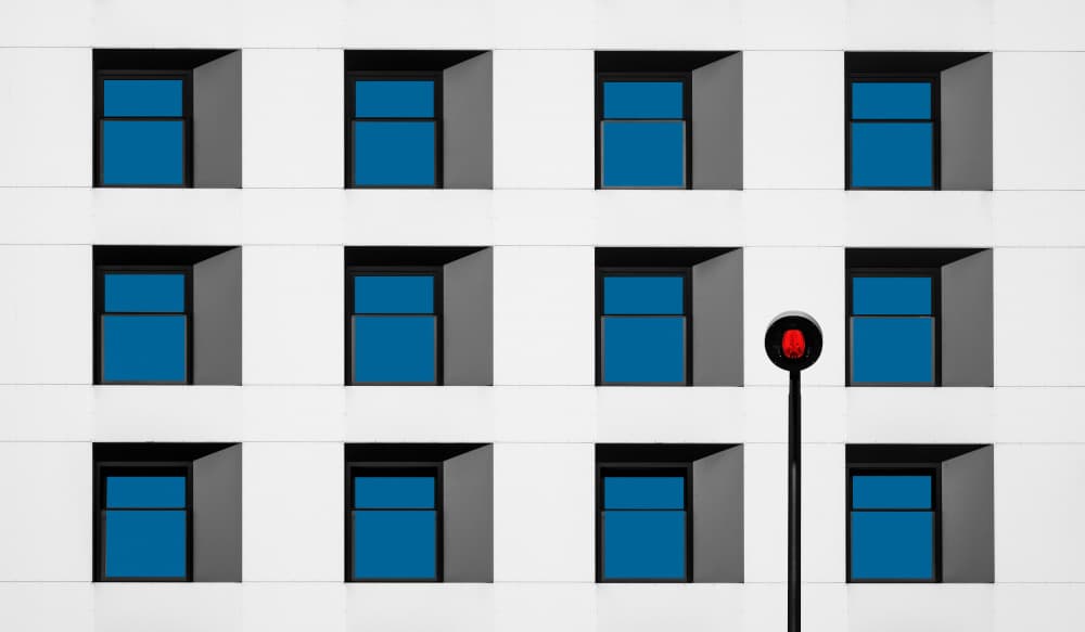 Blue Windows Red Light by Roland M Schwerdtfeger — canvas wall art