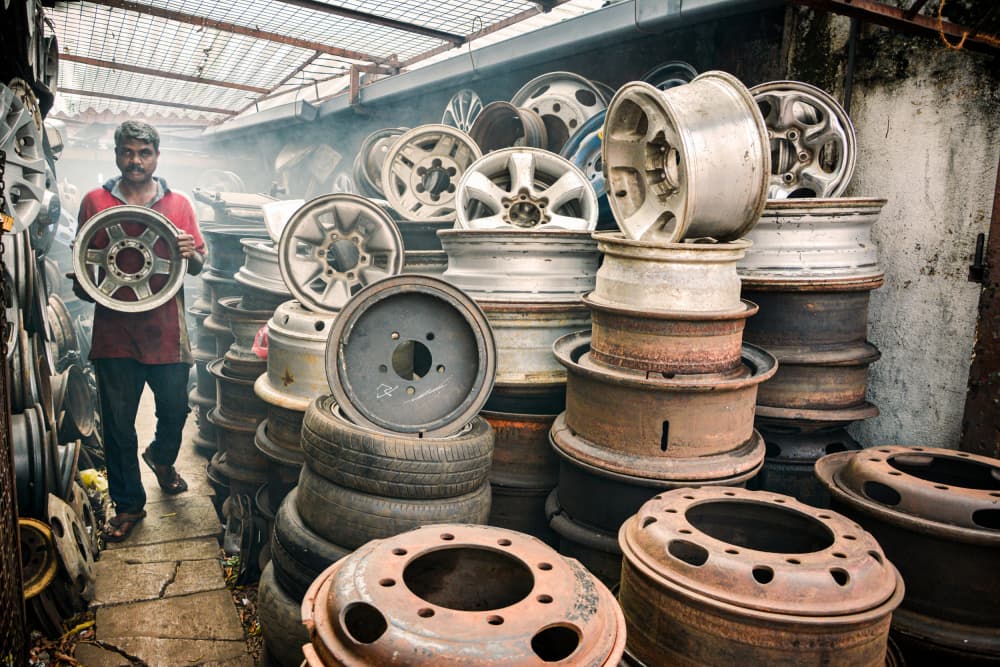 Man with Car Wheels by Samara Ratnayake — canvas wall art