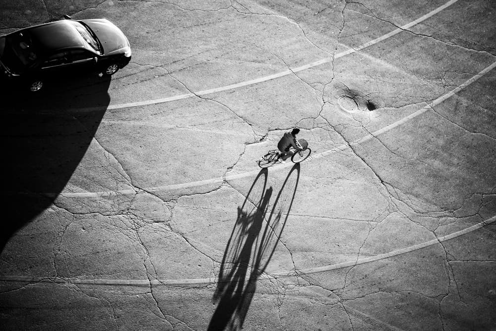Urban Rider Shadows by Zhou Chengzhou — canvas wall art