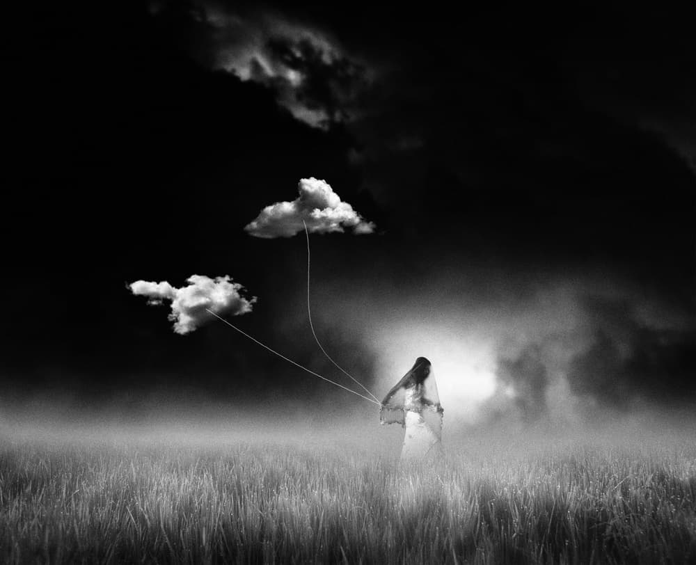 Woman Holding Clouds by Hari Sulistiawan — canvas wall art