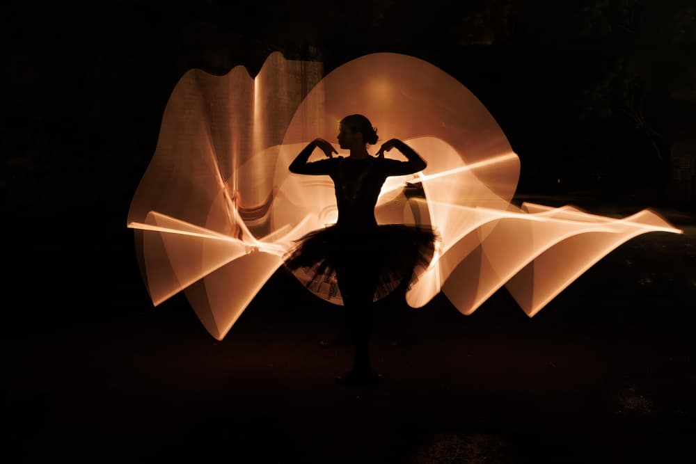 Glowing Ballerina Silhouette by David Bennion — canvas wall art