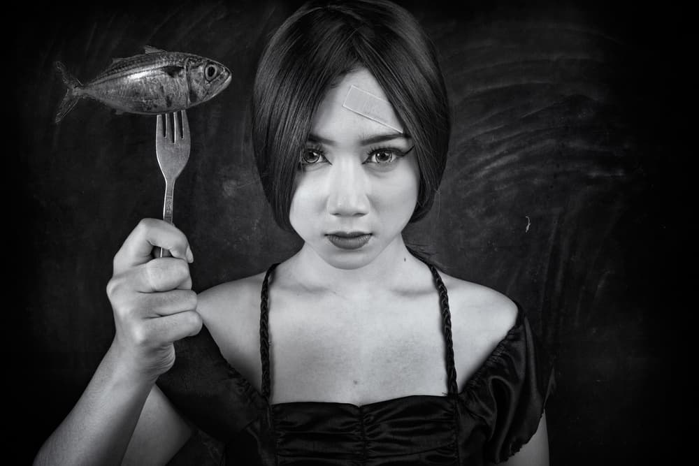 Woman With Fish Fork by Arief Siswandhono — canvas wall art