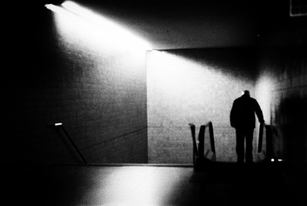 Man On Dark Escalator by Paulo Abrantes — canvas wall art