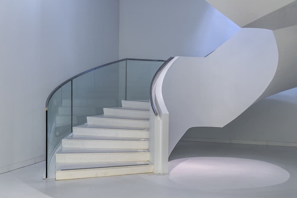 Modern White Curved Staircase by Theo Luycx — canvas wall art