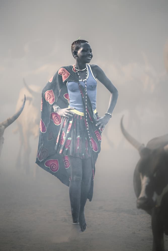 Serene Woman Cattle Haze by Trevor Cole — canvas wall art
